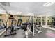 Community gym offering various exercise machines and natural light at 6900 Roswell Rd # F6, Atlanta, GA 30328
