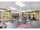Community gym featuring weights, mirrors, and various machines for exercise at 6900 Roswell Rd # F6, Atlanta, GA 30328