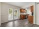 Modern kitchen with stainless steel appliances and hardwood floors at 6900 Roswell Rd # F6, Atlanta, GA 30328