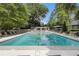 Enjoy this community pool and surrounding lounge area at 6900 Roswell Rd # F6, Atlanta, GA 30328