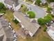 Aerial view showcasing a well-maintained yard and charming neighborhood at 138 Fox Creek Dr, Woodstock, GA 30188