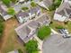 Neighborhood aerial view showcasing the community and meticulously maintained lawns at 138 Fox Creek Dr, Woodstock, GA 30188