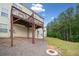 This home features a beautiful backyard with a wooden deck and plenty of green space at 138 Fox Creek Dr, Woodstock, GA 30188
