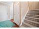 Foyer featuring hardwood floors, stairway, and multiple doors at 138 Fox Creek Dr, Woodstock, GA 30188