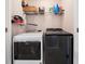 Laundry room with a modern washer and dryer at 138 Fox Creek Dr, Woodstock, GA 30188