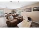 Comfortable living room with plush seating and a view of the outdoor area at 138 Fox Creek Dr, Woodstock, GA 30188