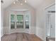 Bright dining room with a bay window and decorative molding at 481 Jefferson Chase Se Cir, Atlanta, GA 30354