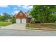 Lovely two-story home featuring brick accents, a lush lawn and mature landscaping at 481 Jefferson Chase Se Cir, Atlanta, GA 30354