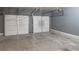 Spacious garage with two car bays and ample room for storage or projects ready for the new homeowner at 481 Jefferson Chase Se Cir, Atlanta, GA 30354
