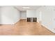 Spacious basement featuring modern wood-look floors and built-in bar with beverage cooler at 5344 Saint Martins Se Ct, Mableton, GA 30126