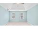 A light and airy bedroom featuring plush carpeting and two windows that let in tons of natural light at 5344 Saint Martins Se Ct, Mableton, GA 30126