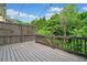 Large wooden deck with string lights and privacy lattice, perfect for outdoor gatherings at 5344 Saint Martins Se Ct, Mableton, GA 30126