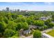 City skyline view with lush trees, apartments, and beautiful scenery at 115 Peachtree Memorial Nw Dr # C1, Atlanta, GA 30309