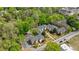 Aerial view showcasing the property's buildings and green surroundings at 115 Peachtree Memorial Nw Dr # C1, Atlanta, GA 30309