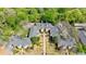 Aerial view of the property showcasing its U-shape design, manicured landscaping, and parking areas at 115 Peachtree Memorial Nw Dr # C1, Atlanta, GA 30309