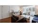 Inviting living room showcases hardwood floors, a bay window, and comfortable seating arrangements at 115 Peachtree Memorial Nw Dr # C1, Atlanta, GA 30309