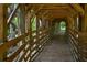 Charming wooden bridge surrounded by verdant greenery, creating a peaceful and picturesque natural pathway at 115 Peachtree Memorial Nw Dr # C1, Atlanta, GA 30309