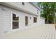 Back deck with stylish gray wood and light gray home exterior at 3070 Branford Ct, Marietta, GA 30062