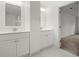Bright bathroom with double vanity, white cabinets, white countertops, tile flooring at 3070 Branford Ct, Marietta, GA 30062