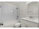 All-white bathroom with subway tile, modern vanity, and shower-over-tub at 3070 Branford Ct, Marietta, GA 30062