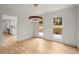 Dining area showcasing ample natural light, contemporary light fixture, and adjacent kitchen space at 3070 Branford Ct, Marietta, GA 30062