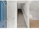 Bright entryway showcasing staircase, hardwood floors, and blue front door at 3070 Branford Ct, Marietta, GA 30062