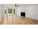 Cozy living room featuring a fireplace and large windows at 3070 Branford Ct, Marietta, GA 30062