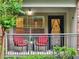 Relaxing balcony space with seating, greenery, and neighborhood views, creating a serene outdoor retreat at 5559 Glenridge Dr # 1103, Sandy Springs, GA 30342