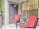 Cozy balcony area with comfortable seating, perfect for enjoying outdoor relaxation and neighborhood views at 5559 Glenridge Dr # 1103, Sandy Springs, GA 30342