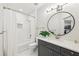 Bright bathroom features a modern vanity, contemporary fixtures, and a shower with a tub at 5559 Glenridge Dr # 1103, Sandy Springs, GA 30342