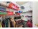 Walk-in closet providing ample storage with multiple shelves and hanging space for clothes and personal items at 5559 Glenridge Dr # 1103, Sandy Springs, GA 30342