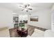 Modern living room features wood floors, recessed lighting, neutral furniture, creating a stylish and inviting space at 5559 Glenridge Dr # 1103, Sandy Springs, GA 30342
