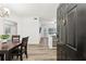 Inviting living room showcasing an open floor plan with updated floors and a view to the kitchen at 5559 Glenridge Dr # 1103, Sandy Springs, GA 30342