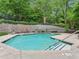 Relaxing community pool with lounge chairs surrounded by lush landscaping at 5559 Glenridge Dr # 1103, Sandy Springs, GA 30342