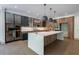 Modern kitchen featuring a large marble island, stainless steel appliances, and stylish cabinetry at 71 Ramey Rd, Sugar Hill, GA 30518