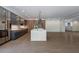 Elegant kitchen with marble island, modern cabinetry, and hardwood floors in an open layout at 71 Ramey Rd, Sugar Hill, GA 30518