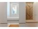 Cozy mudroom with built-in storage, a window, and a comfortable bench at 71 Ramey Rd, Sugar Hill, GA 30518