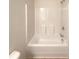 Bathroom featuring tub and shower combination and tile floors at 7526 Stone Creek Path, Lithonia, GA 30038