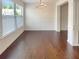 Well-lit dining room with hardwood floors and classic trim at 7526 Stone Creek Path, Lithonia, GA 30038