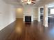 Bright living room with a fireplace and open floor plan at 7526 Stone Creek Path, Lithonia, GA 30038