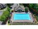 An aerial view of the neighborhood's pool with ample lounge chairs for community enjoyment at 10898 Gallier St, Johns Creek, GA 30022