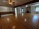 Spacious living room featuring hardwood floors, exposed beams and a fireplace at 237 Sandra Nw Dr, Lilburn, GA 30047