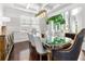 Bright dining room featuring an elegant table, stylish chairs, and a modern chandelier at 2906 Ansley Manor Ct, Marietta, GA 30062