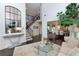 Stunning foyer with a curved staircase, hardwood floors, and views into the dining room at 2906 Ansley Manor Ct, Marietta, GA 30062