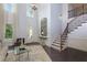 Elegant foyer with soaring ceilings, hardwood floors, grand staircase, and lots of natural light at 2906 Ansley Manor Ct, Marietta, GA 30062