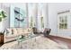 Bright living room with high ceilings and big windows with lots of natural light and neutral decor at 2906 Ansley Manor Ct, Marietta, GA 30062