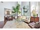 Bright living room with high ceilings, neutral decor, and an open view into the dining area at 2906 Ansley Manor Ct, Marietta, GA 30062