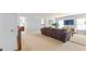 Cozy loft area featuring a sectional couch, wall-mounted TV, and large windows at 2906 Ansley Manor Ct, Marietta, GA 30062