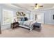 Spacious main bedroom with tray ceilings, carpet floors, and large windows at 2906 Ansley Manor Ct, Marietta, GA 30062
