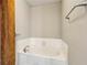 Cozy bathroom featuring a white tiled bathtub with a chrome faucet at 350 Peters Sw St # 6, Atlanta, GA 30313